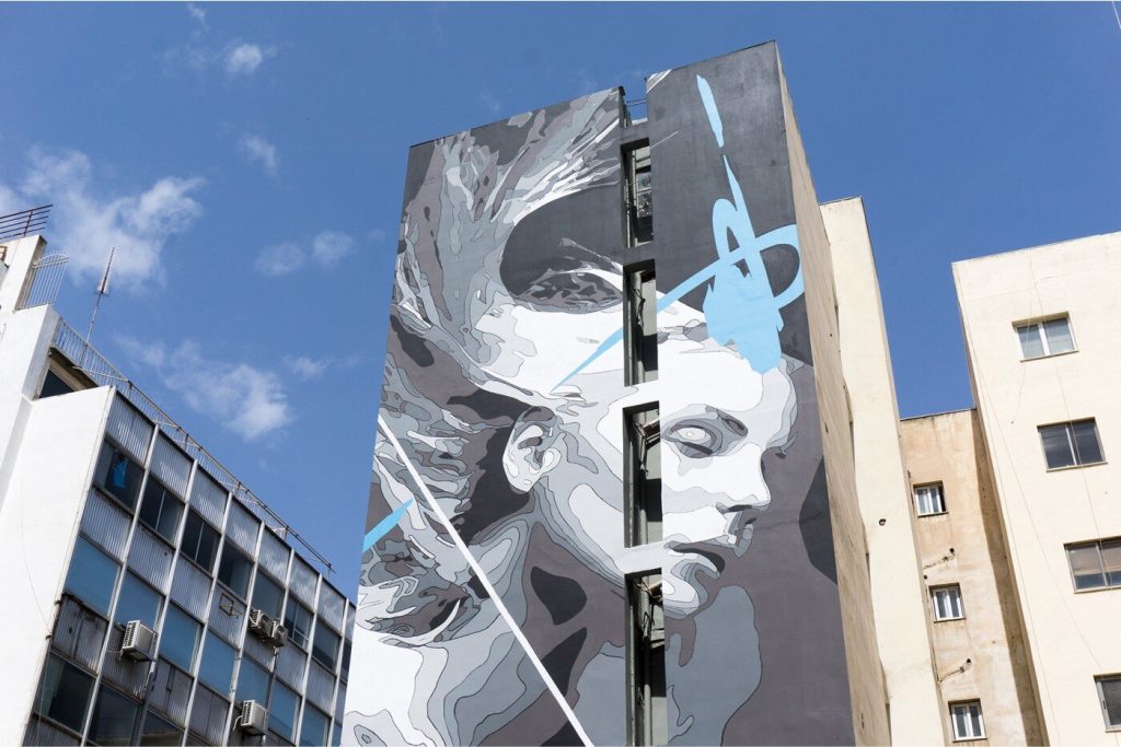 INO Creates Large Scale Murals With Powerful Social Commentaries
