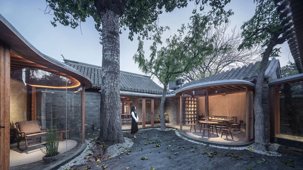Archstudio Renovates A House With Curving Glass