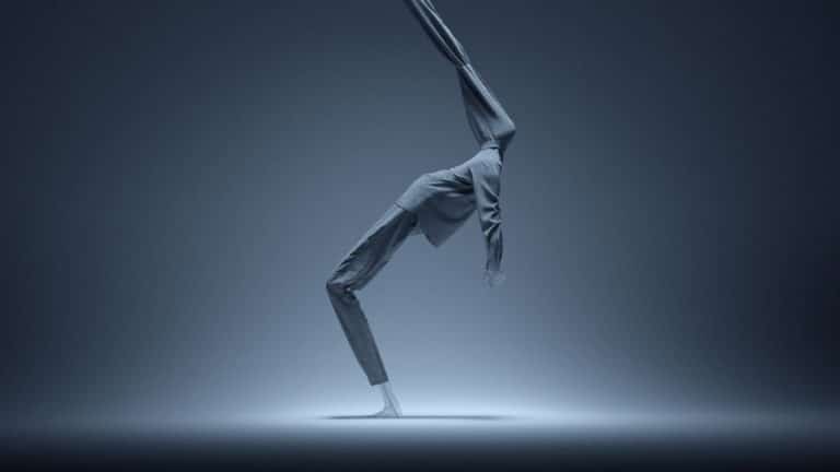 Arice Contemplates The Challenges Of Creative Process Elegant business professional bending backwards performing yoga in a contemporary studio.