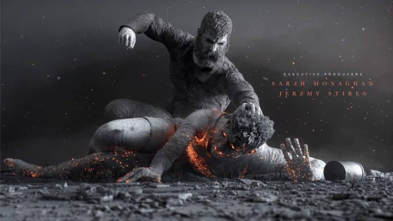 "We Were Young" Examines Brutality Of Imaginary World A gritty black-and-white scene of two wrestlers in a fierce match with sparks flying, emphasizing intense sports action and struggle.