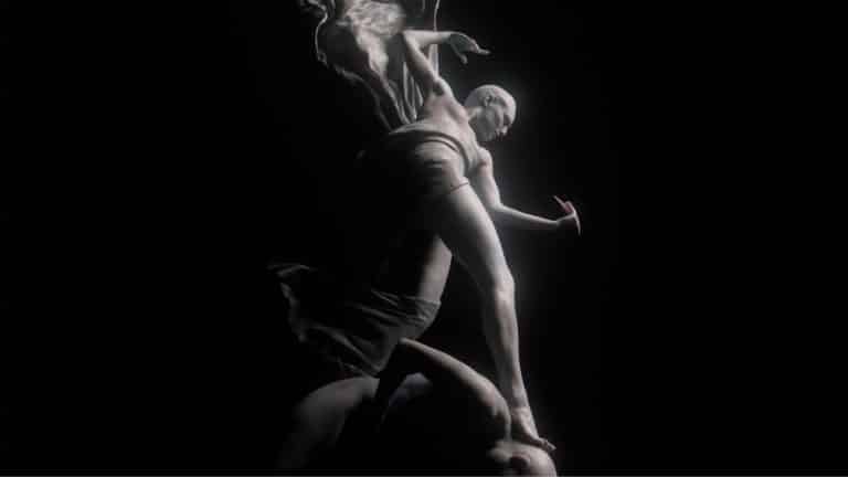 "We Will Sin Together" Explores The Encounter Of Alter Egos Elegant black and white sculpture of two dancers capturing movement and emotion.
