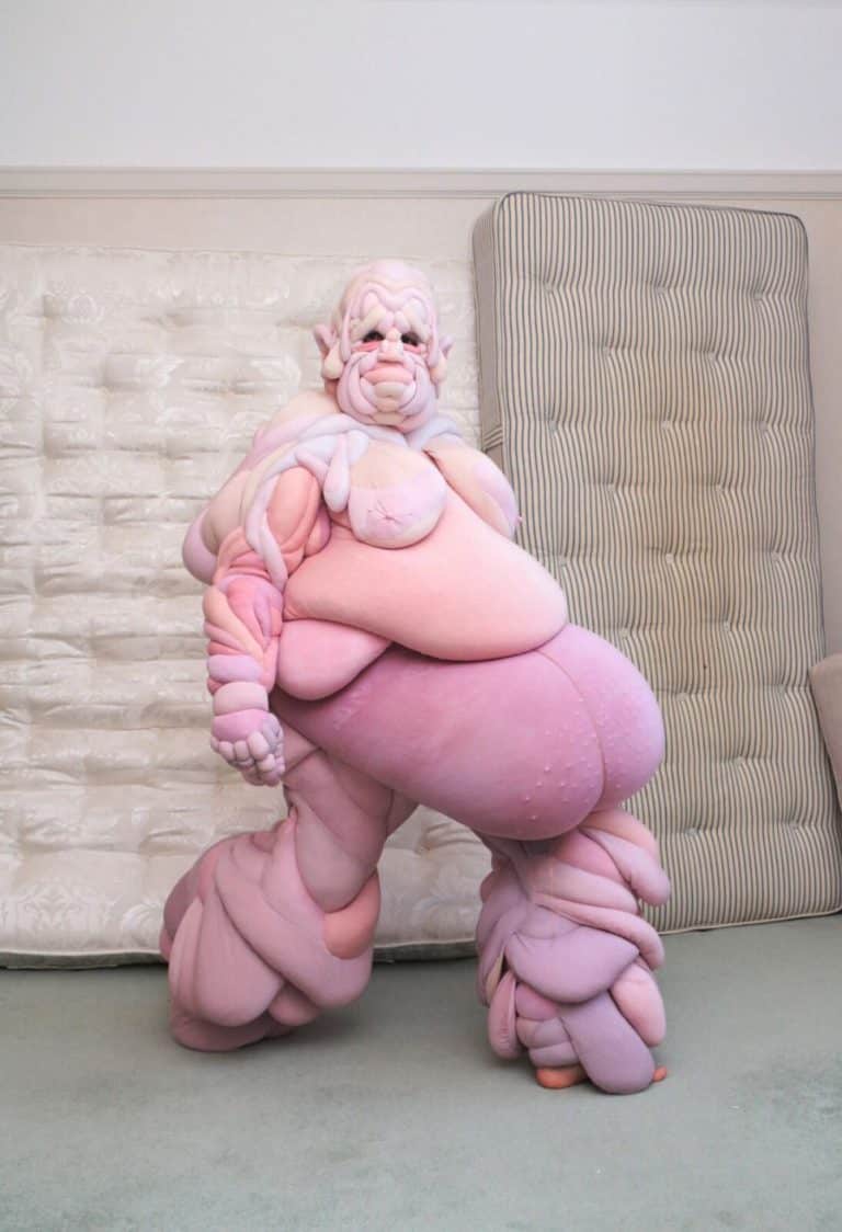 Interview with Daisy Collingridge Unusual pink plush sculpture resembling a fantastical creature with exaggerated features.