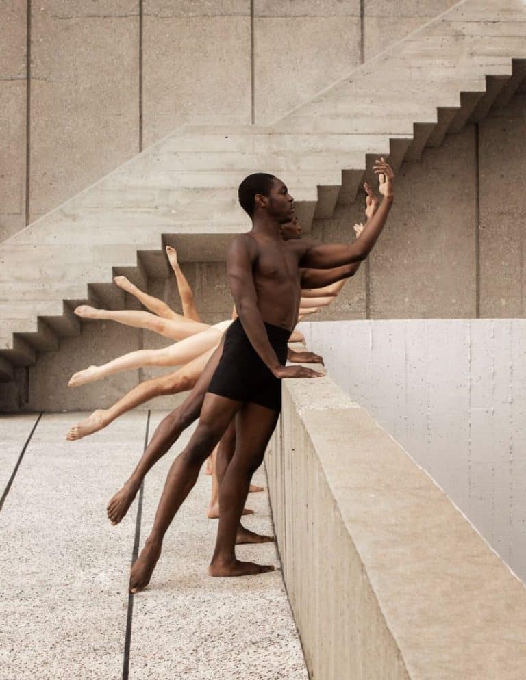 Interview With Rob Woodcox Elegant male and female dancers practicing contemporary dance at an urban architecture setting.