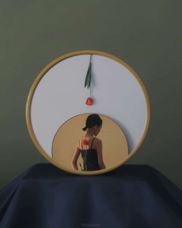 Interview with Ziqian Liu Minimalist wall clock with a woman and a flower reflection, modern interior decor, artistic design, creative home wall art, visual Atelier 8.