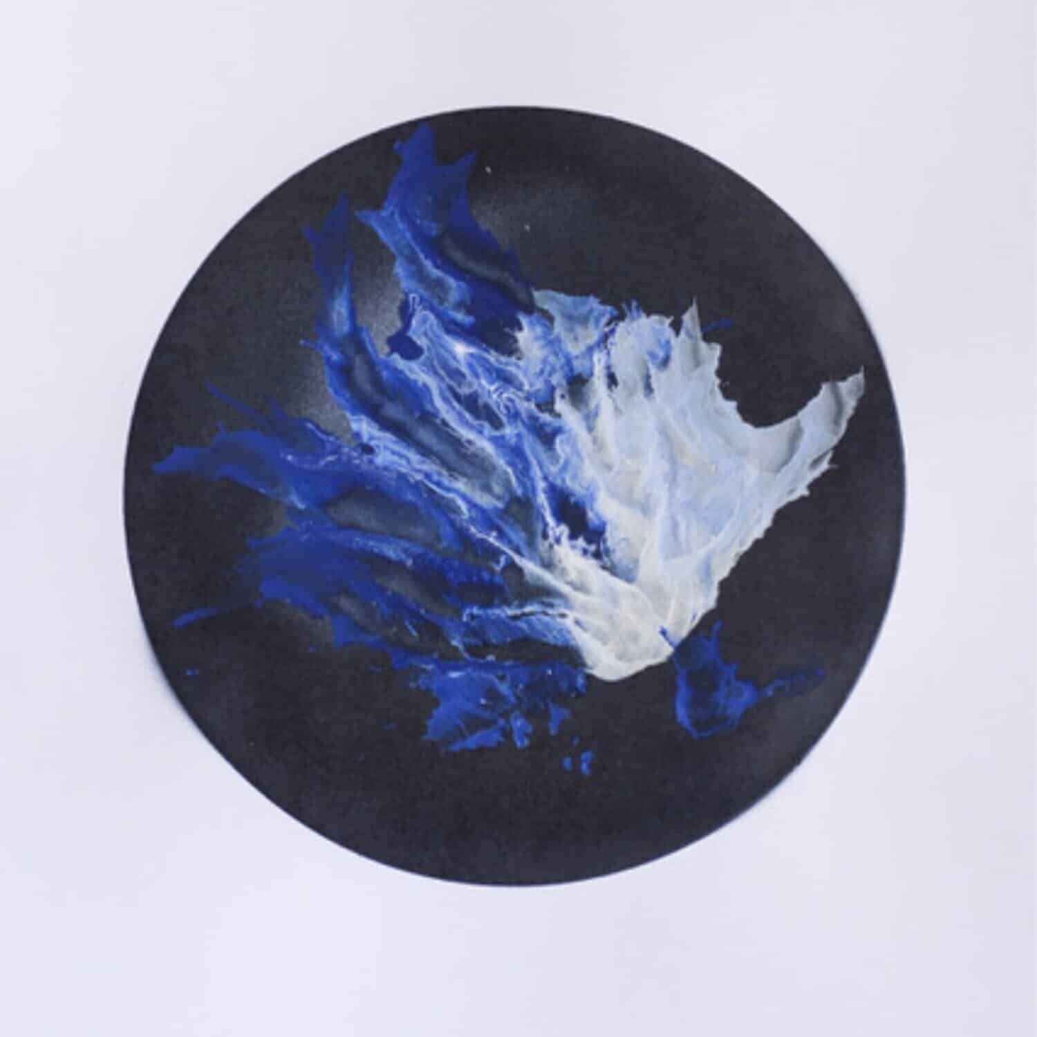 Vibrant abstract painting featuring blue and white fluid shapes on a black circular background.