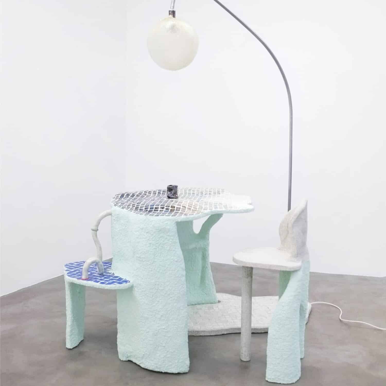 Unique sculptural furniture piece with textured surfaces and modern design.