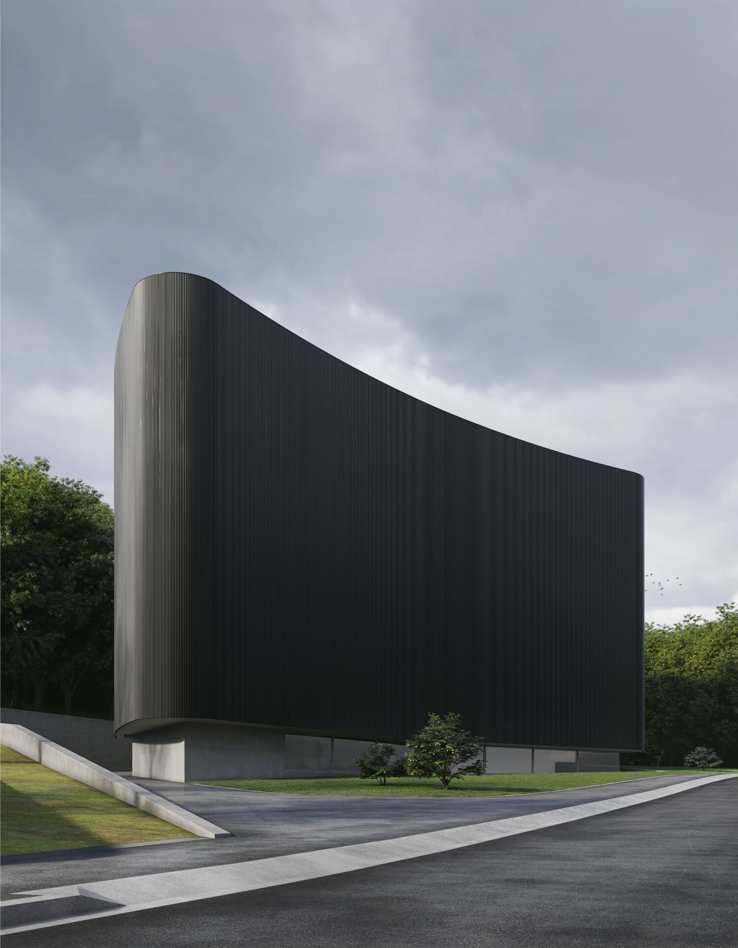 Futuristic black modern building with sleek design and curved architecture.