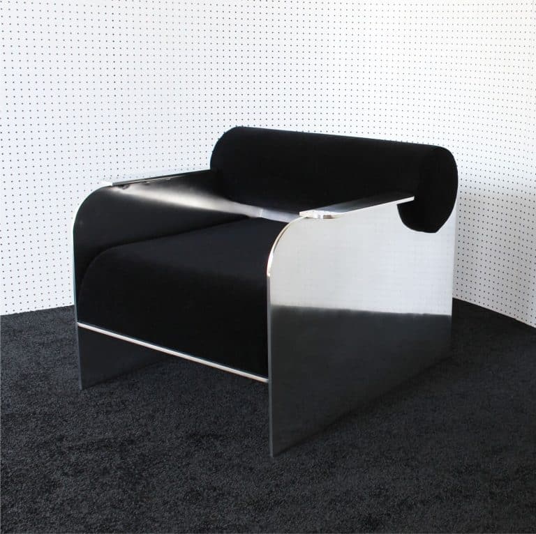 Crump & Kwash Designs Customizable June Lounge Chair Contemporary black and silver designer lounge chair with modern aesthetic.