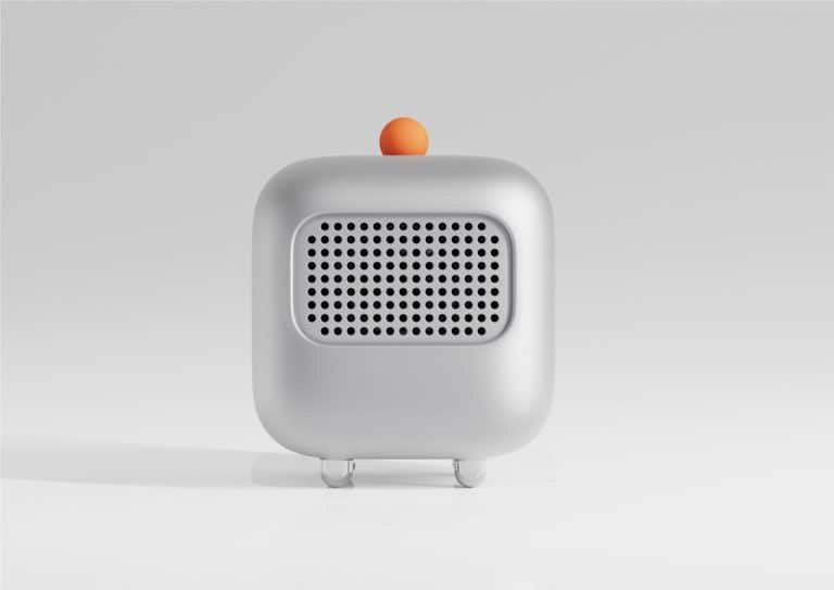 Compact modern air purifier with a minimalist design featuring a white body and an orange top circle.