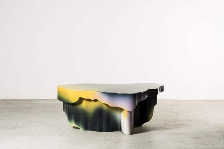 Guise Collection Flows Within Relative Continuities Colorful modern sculptural table with organic design and vibrant glaze finish.