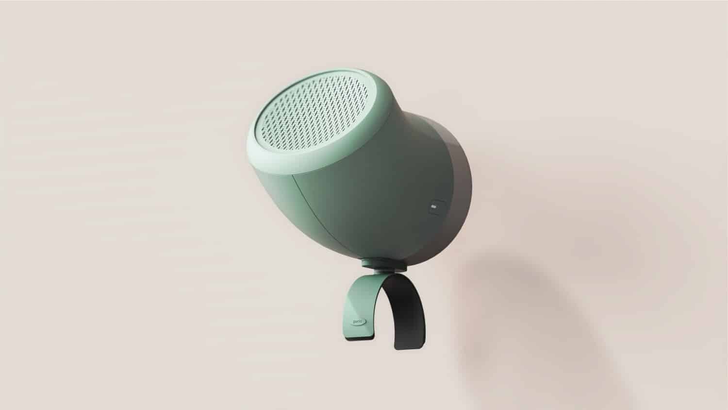 Wireless portable speaker with sleek modern design in mint green and black, perfect for stylish home audio.