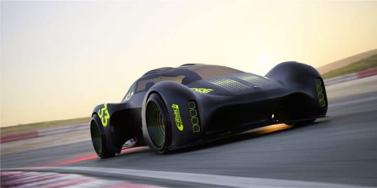 Futuristic black and neon green racing car on a track at sunset.