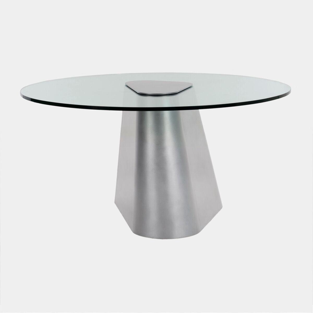 Sleek modern glass dining table with metallic base for contemporary interior design.