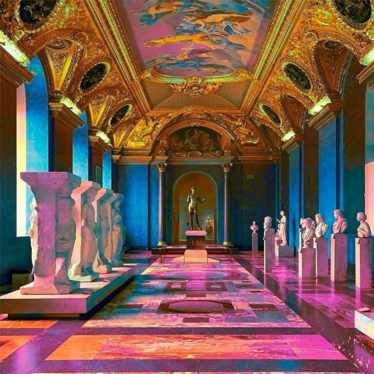 Nathan Head Uses Color Inversion To Stimulate The Eye Colorful grand hall with classical sculptures, ornate gold ceiling, and vibrant lighting, inspired by luxurious art history settings.