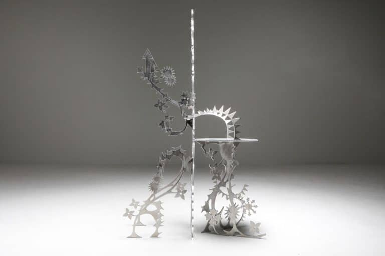 Orson Oxo Van Beek Researches The Historical Emblems Through Ornamentum Intricate metallic sculpture with floral and geometric designs, modern art piece by Visual Atelier 8.