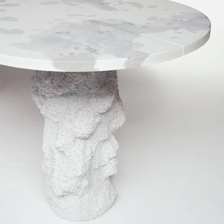 Pettersen & Hein Shapes A Piece Of Your Private Sky Vibrant concrete table with a polished marble top and textured sculptural base, modern design for contemporary interiors.