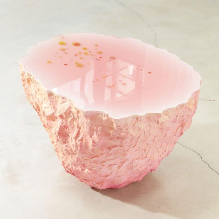 Terra (In)Firma By Flavie Audi Suspends Between Natural And Artificial Vibrant pink resin and natural stone bowl, artisanal handmade decor piece, perfect for modern interior design.