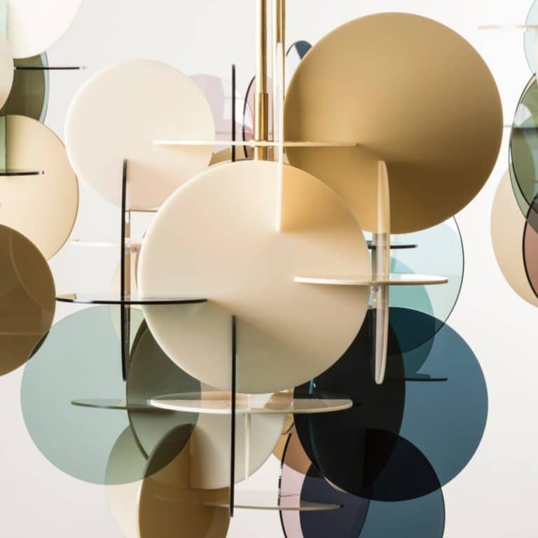 Vibeke Fonnesberg Schmidt Creates Lamps In A New Idiom Colorful geometric wall art featuring overlapping spheres in various pastel and dark shades.