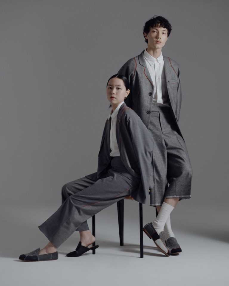 Hyunse Kim: A Revolutionary Stitch in the Fabric of Global Fashion Elegant fashion models wearing contemporary tailored suits for modern professional style.