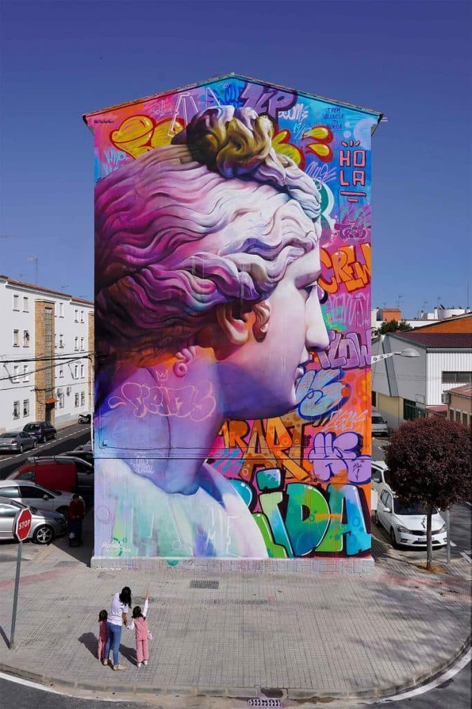 Harmonious Conversations: The Fusion of Classical Elegance and Street Energy in PichiAvo's Urban Murals