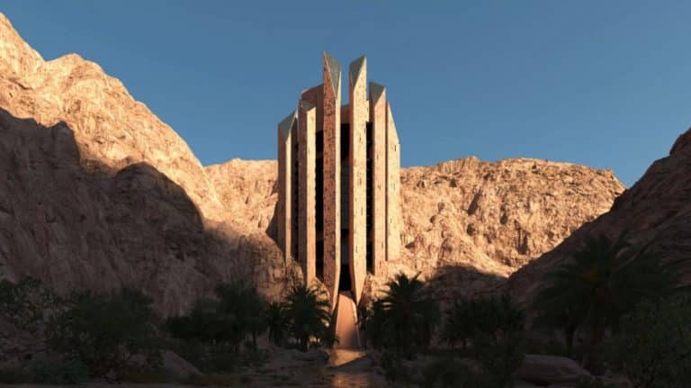 NEOM Unveils Leyja, An Enchanting Ecotourism Oasis Modern desert hotel tower architectural design in rocky canyon setting.