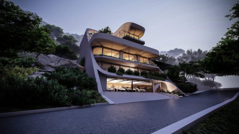 House C25: A Seamless Oceanfront Residence in Cape Town by Architect Omar Hakim Futuristic modern house with sleek curves on a hillside, illuminated at dusk, surrounded by lush greenery.