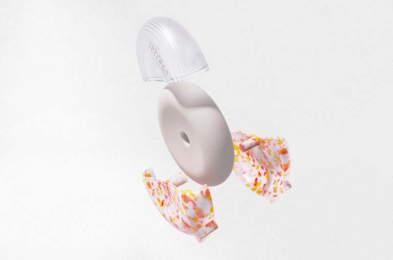 Elanur Aslan's Sustainable Deodorant is Redefining Personal Care Minimalist soap and towel art inspired by modern design. A creative, abstract arrangement of personal care items on a clean white background.