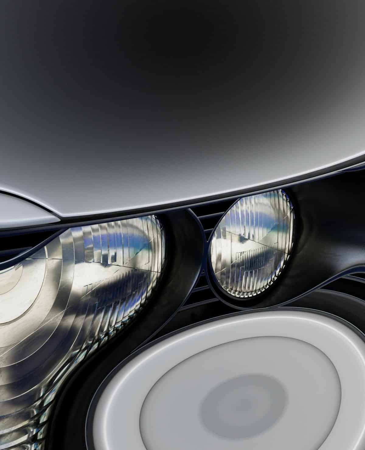 Close-up of modern automotive headlights and sleek design elements at Visual Atelier 8.