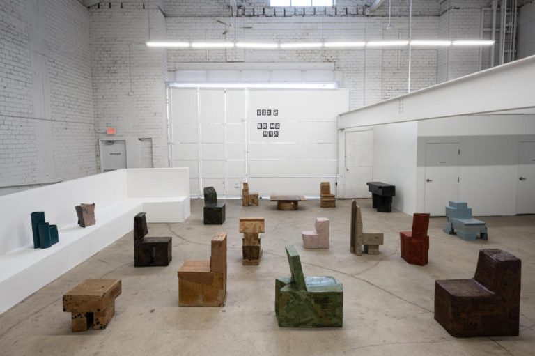 Max Lamb's BOX 2 Exhibition at Gallery FUMI Colorful sculptural chairs in a modern art gallery with industrial design and high ceilings.