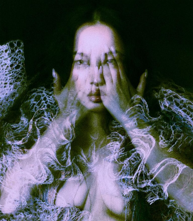 Tsunaina's 'Tissues' is A Captivating Symphony of Love and Vulnerability Vaporwave woman with colorful digital effects and glitch art style.