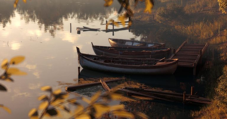 "Forgotten Boats" by Pulla Studio celebrates the quiet elegance of nature Dinghies moored at a tranquil lakeside dock during sunset with golden reflections.
