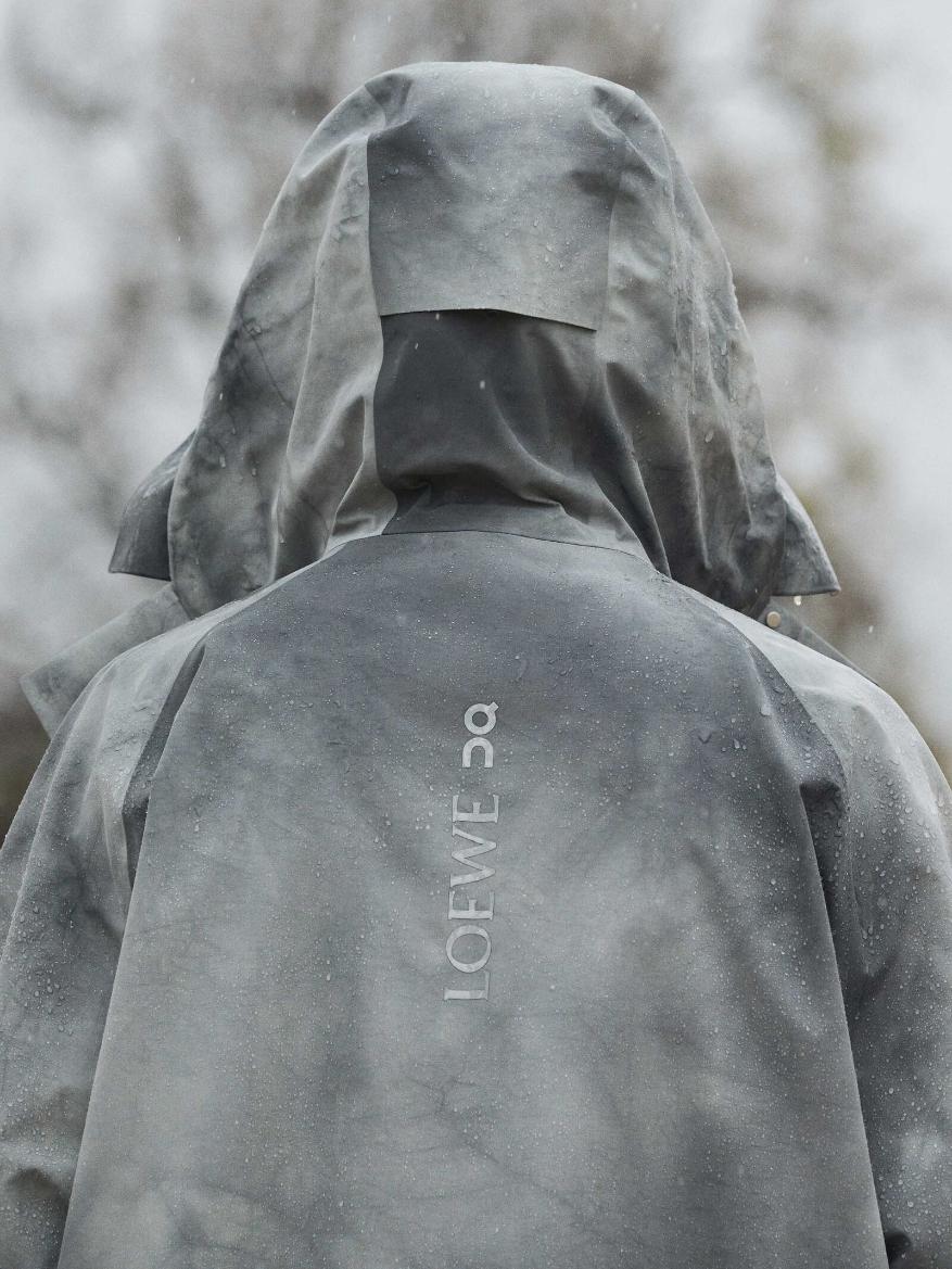 Waterproof outdoor jacket with hood, designed for harsh weather conditions. High-performance, durable, and weather-resistant outerwear.