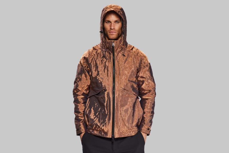 Vollebak's Full Metal Jacket is a testament to innovation Brown camouflage print men's hooded waterproof jacket for outdoor sports and hiking.