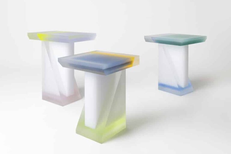 Modern translucent side tables with gradient colors and geometric bases.