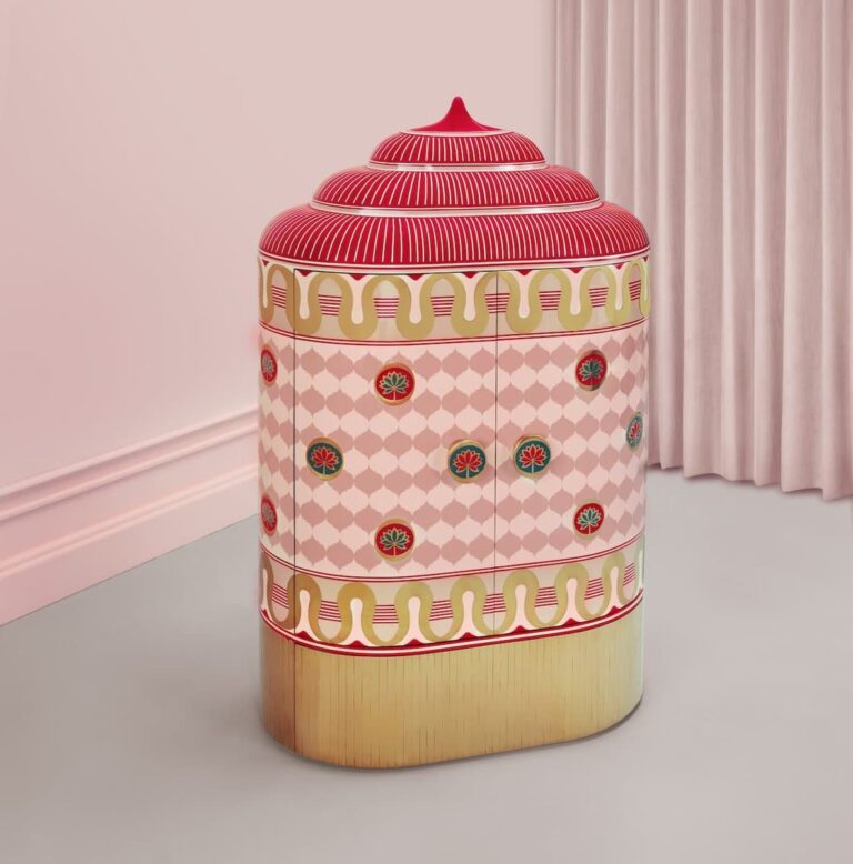Playful cupcake-inspired cabinet with red top and pink patterned body.