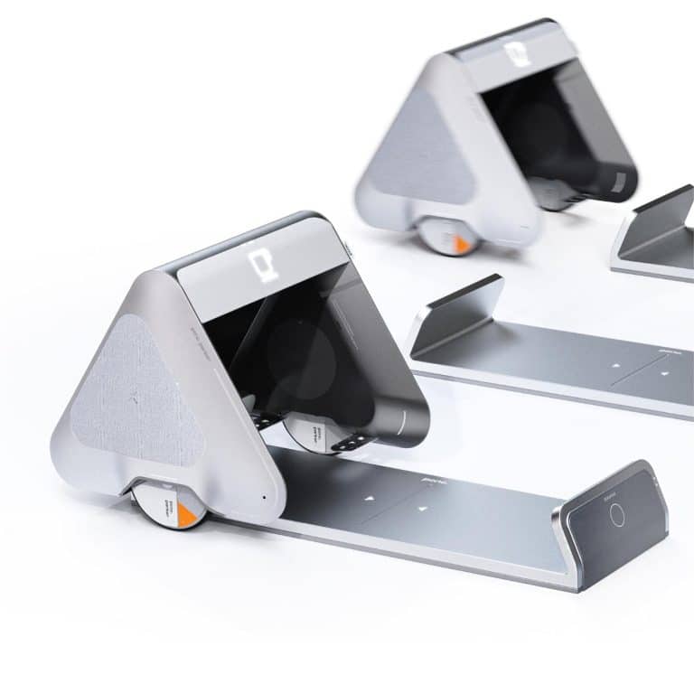 PCNC: Revolutionizing Park Maintenance with Innovative Robotics Wireless charging station with futuristic triangular design for electronic devices.