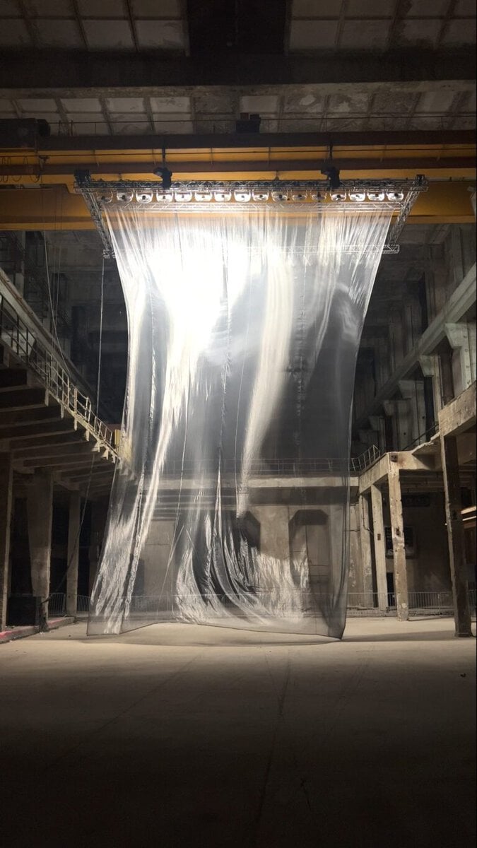 Interview with Boris Acket on the intersection of sound, light, motion and nature Shiny metallic fabric installation in industrial space, contemporary art at Visual Atelier 8.