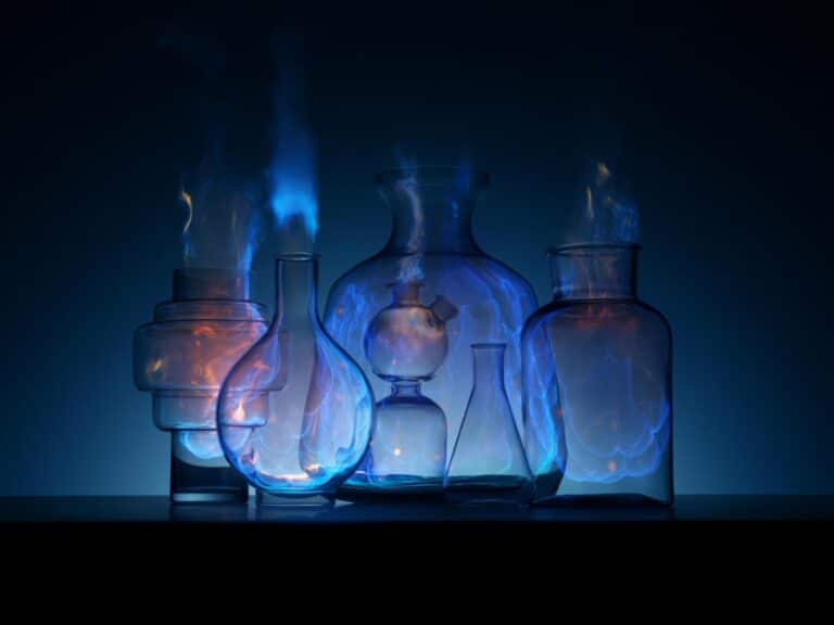 Ignis an artful exploration of fire and duality of progress by Optical Arts Bright blue flames emanate from glass laboratory flasks, creating a captivating scientific experiment scene.