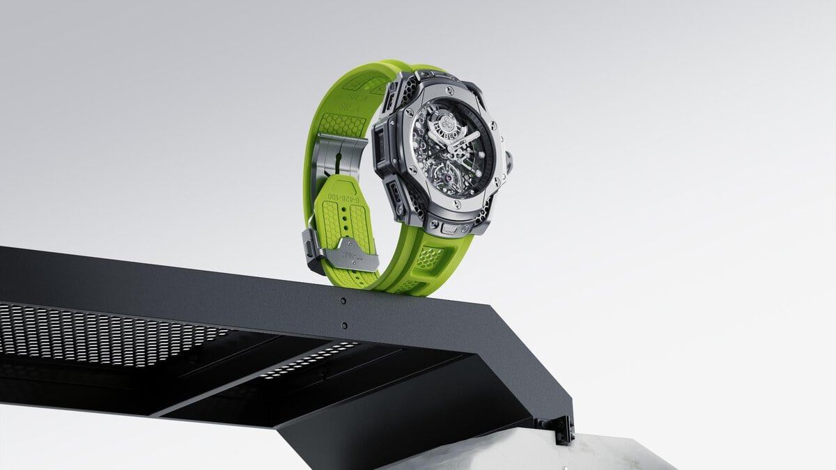 Luxury sports watch with green silicone strap and skeleton dial, modern horology design, high-tech watch craftsmanship, branded luxury timepiece.