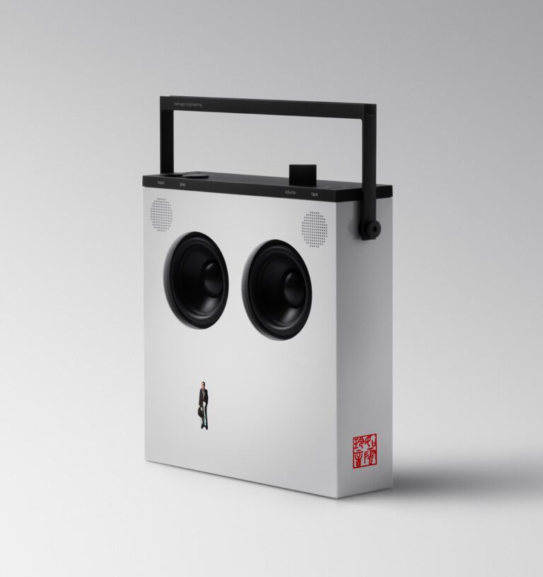 Teenage Engineering launches Limited Edition OB-4 Speaker featuring John Lennon Mind Games Album Minimalist boombox with modern design and black speaker drivers on a white box.