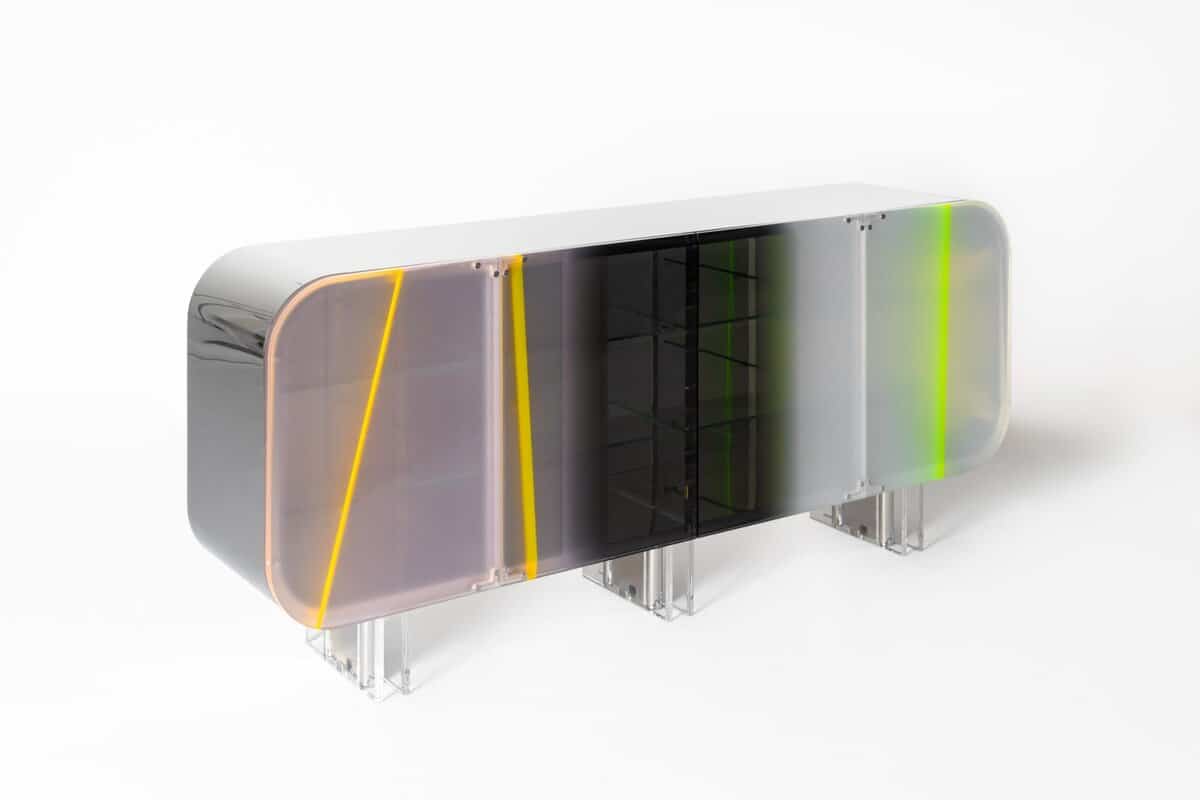 Vibrant multicolor acrylic LED art installation with transparent design and geometric accents.