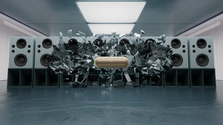 TRAUM INC captured the iconic Beats Pill in a dynamic film High-tech sound system with shattered speakers and a central wireless speaker in a modern, futuristic room.