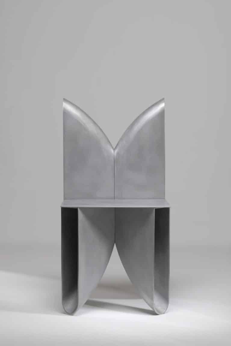 BB Chair by Corpus Studio embodies poetic design and structural innovation Metal butterfly-shaped modern furniture piece.