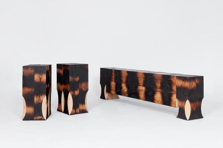 Yoon Shun's Goshun: Wood-burning techniques meets contemporary design Burnt wood furniture set with modern rustic design and distinctive charred finish.