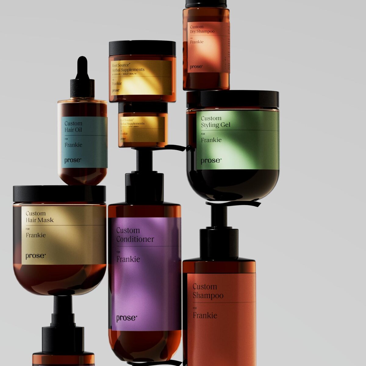 Colorful personalized hair and skincare product bottles on a modern black display stand.