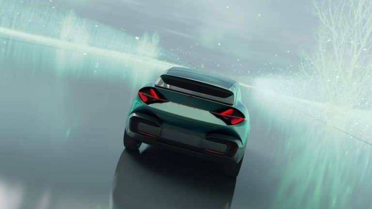 FutureDeluxe crafts an immersive cinematic film for Renault Emblème Sleek electric car on snow-covered landscape with modern design and futuristic appearance.