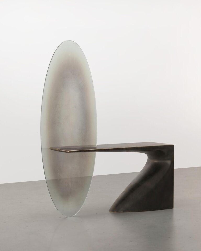 Boldizar Senteski: The visionary behind the Void Mirror Collection Reflective modern art sculpture with a sleek mirror finish and minimalist design.