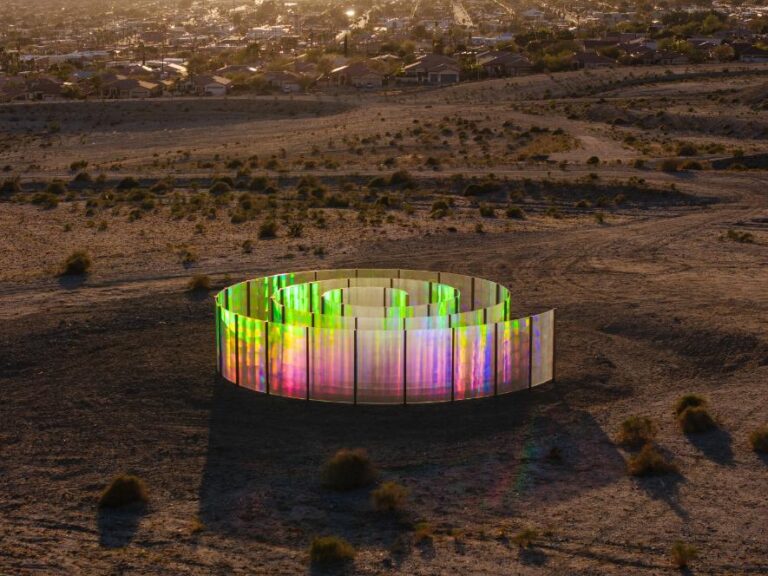 Kimsooja’s mesmerizing light-filled installation for Desert X 2025 Colorful reflective art installation in desert landscape at sunset.