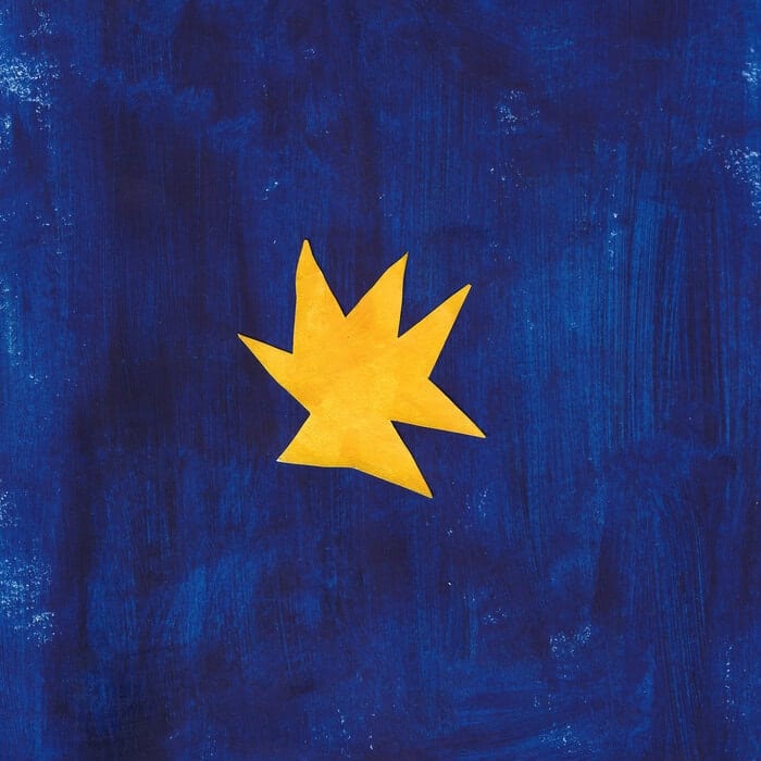 Yellow star shape on a textured blue background, contemporary abstract art piece.