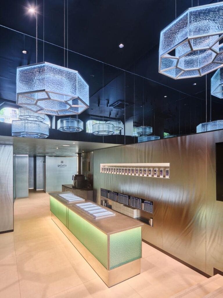Gelato Collection: A luxurious ice cream experience by Albert Adrià Modern ice cream shop interior with stylish lighting and sleek design elements.